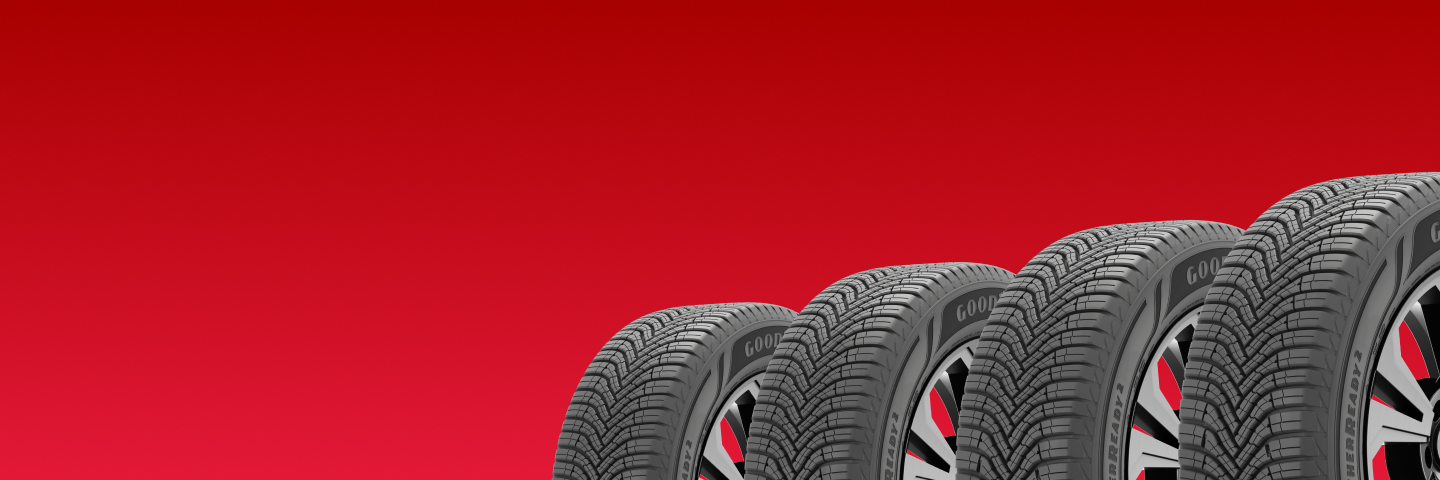 Four Tires on Red Background