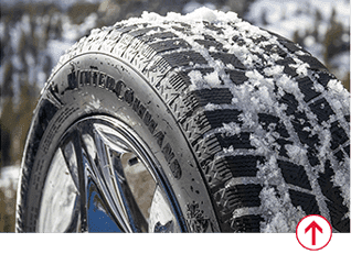 Image of tire tread filled with snow             